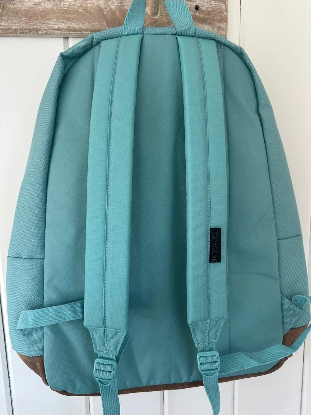 Jansport Light Teal Backpack with Brown Suede-Look Base